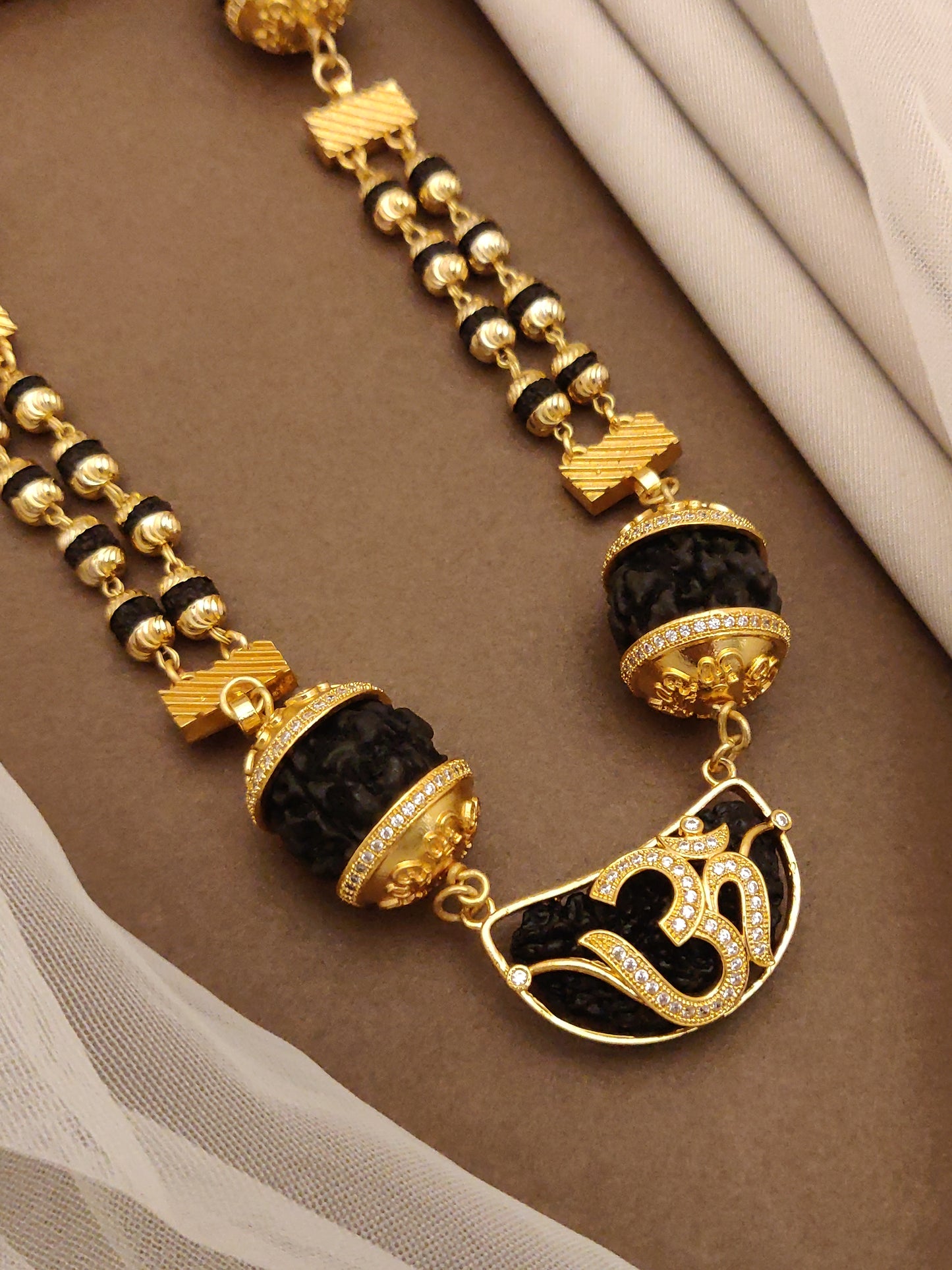 Rudraksha Mala with OM Diamond Kaju Pendant for Men.